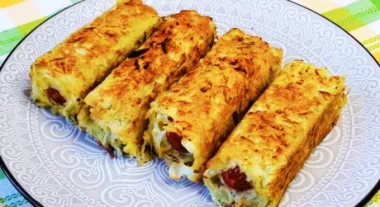 Сосиски в картопляній шубці